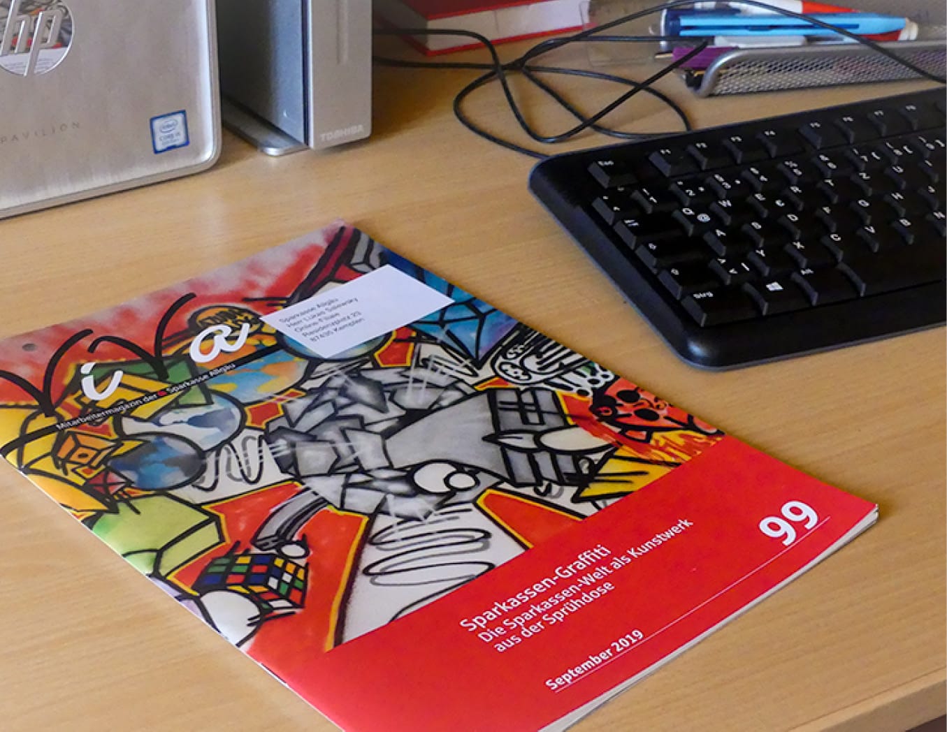 Graffiti in Mitarbeiterzeitschrift